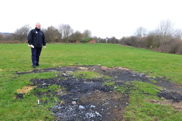 Station Manager Kevin Burns at the site of one of the malicious fires at Peat Carr.