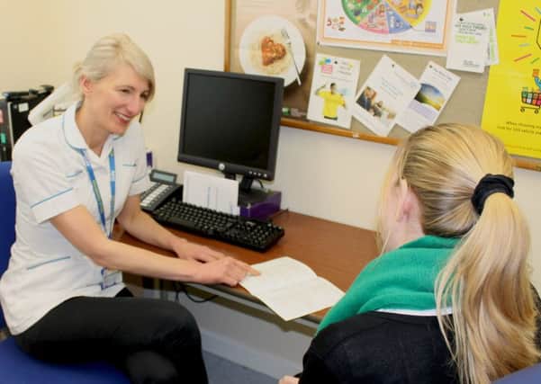 Lucy Matheson, lead dietitian at South Tyneside NHS Foundation Trust, giving a patient a nutrition assessment