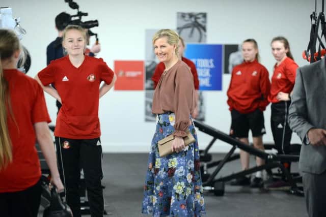 The Countess of Wessex chats with some of the young people using the gym at The Beacon of Light.