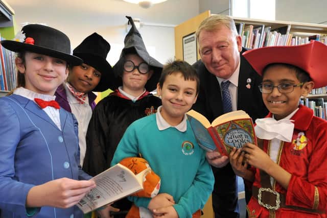 Valley Road Academy students with Coun John Kelly on World Book Day.