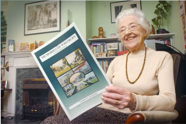 Sybil with her book of Memories of Whitburn
