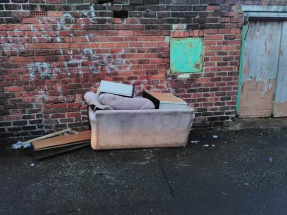 Edward Gill was spotted with the sofa that was dumped in Hendon.