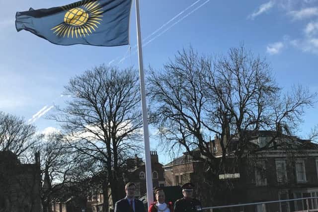 Coun Michael Mordey; Mayor of Sunderland Coun Lynda Scanlan, and Deputy Lieutenant of Tyne and Wear, Mr Norman Taylor MBE at the ceremonial raising of the Commonwealth Flag
