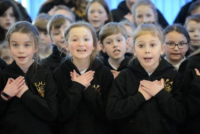 Pupils at East Herrington Primary Academy practice their singing.