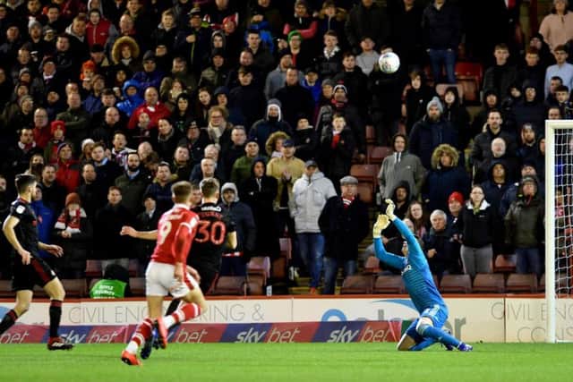 Jon McLaughlin makes an important save in the draw with Barnsley.