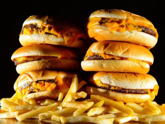 McDonald's has come under fire for its Monopoly promotion, which critics say will encourage unhealthy eating.