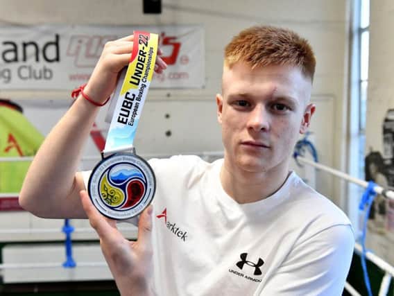 Kieran MacDonald with his silver medal, won at the recent European under-22 championships in Russia.