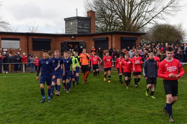 Teams filing out ahead of a match held at Silksworth CW held in memory of Connor Brown.