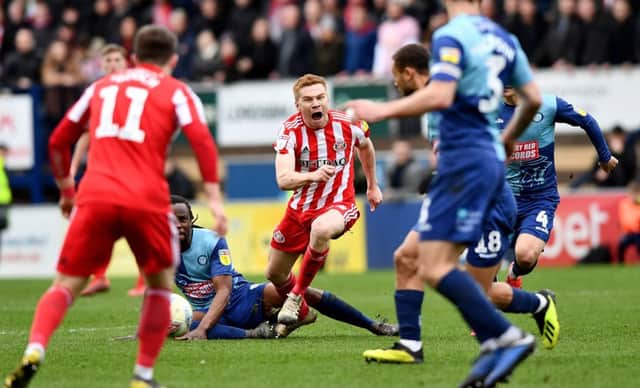 Duncan Watmore was wiped out by a bad challenge from Wycombe midfielder Marcus Bean.