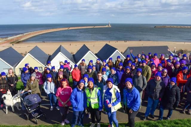 The walkers get ready to leave Roker earlier on today.
