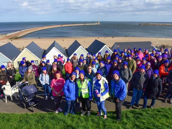 The walkers get ready to leave Roker earlier on today.