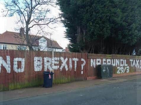 The graffiti was also written on fences.