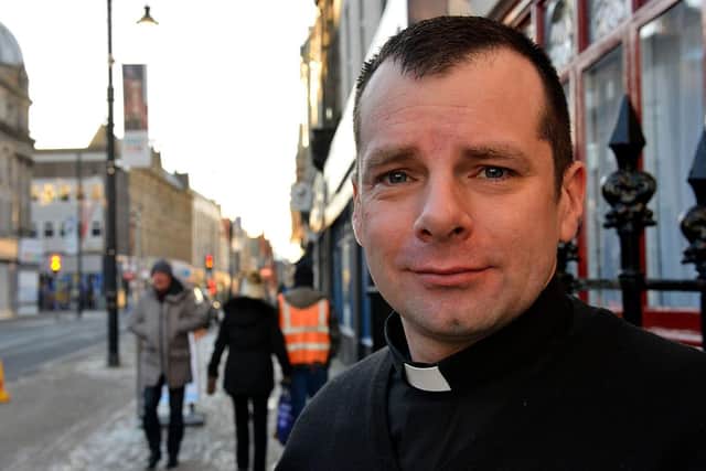 Father Marc Lyden-Smith outside St Mary's RC Church in Sunderland city centre.
