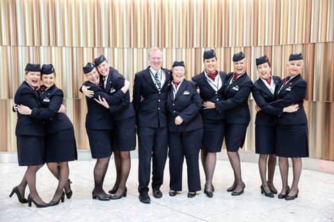 Mark Eastaugh and his mum Margaret Eastaugh (centre) along with other staff and their mums who were working together on a flight for Mother's Day pictured at T5, London Heathrow.