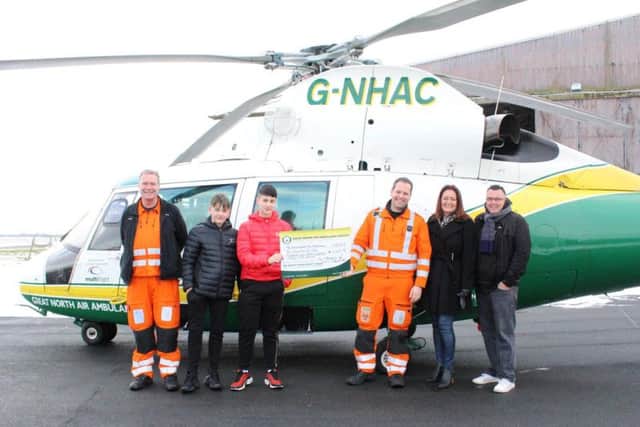 GNAAS Pilot Jay Steward, Theo and Dion Economides, Dr Dion Abid, Anita Economides and family friend Craig Breckon