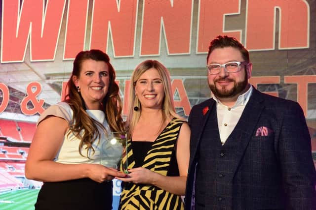 Fundraiser o the Year Award winners Emma (left) and Sergio (right)  Petrucci presented by Emily Downes (centre)  Regional CSR Specialist - The North Group Communicatiuons BGL Group  Sunderland Echo Best of Wearside Awards 2019 at the Stadium of Light.