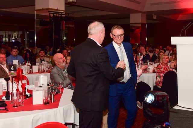 Kevin Ball and Brian Henderson, father of Jordan Henderson, get up to collect the Special Awards given to the two Jordans - Henderson and Pickford.