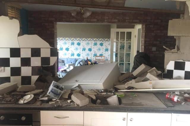 Debris could be seen inside the flat involved in the suspected gas explosion in photos released by Tyne and Wear Fire and Rescue Service.