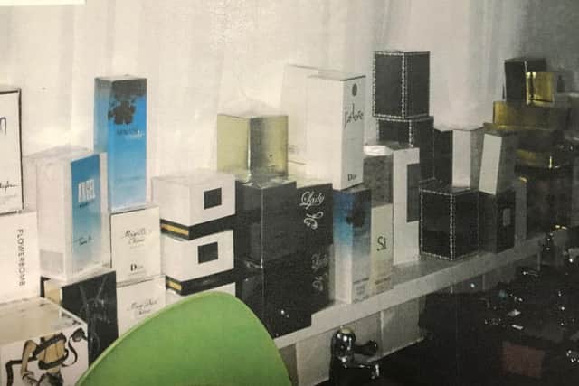 Counterfeit fragrances found at Kelly Trott's home