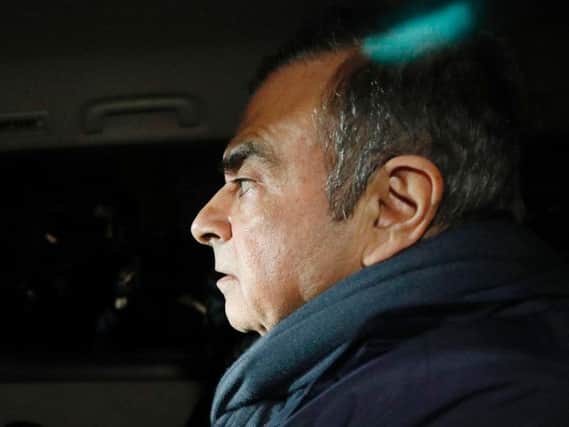 Nissan Chairman Carlos Ghosn in a car leaves his lawyer's office in Tokyo. Japanese prosecutors took Ghosn for questioning Thursday, April 4, 2019, barely a month after he was released on bail ahead of his trial on financial misconduct charges. Picture by Takuya Inaba/Kyodo News via AP