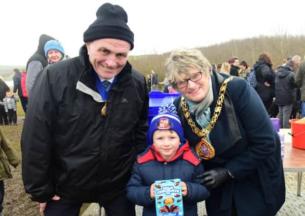 Coun Doris MacKnight with her husband consort Keith with one of the prize winners Blake Carr, 5, of Ashbrooke.