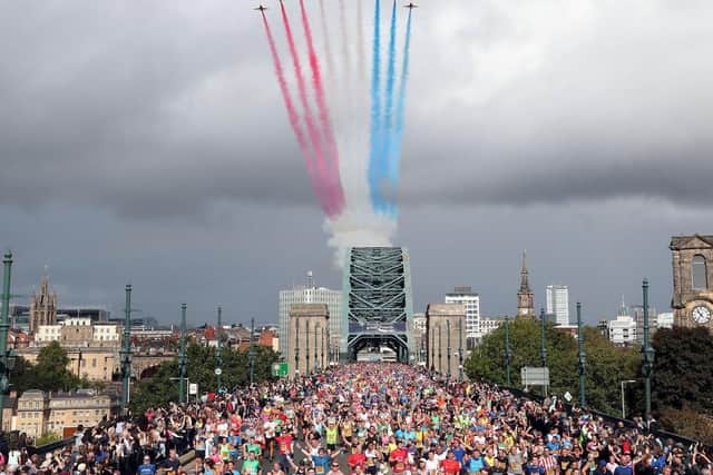 Great North runners head across the Tyne Bridge.