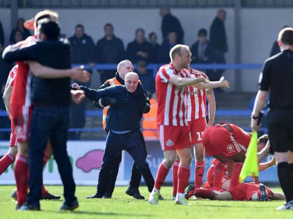 Sunderland significantly boosted their automatic promotion hopes with a late winner at Spotland