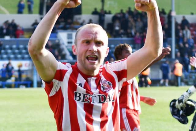 Dylan McGeouch celebrates Sunderland's late win against Rochdale