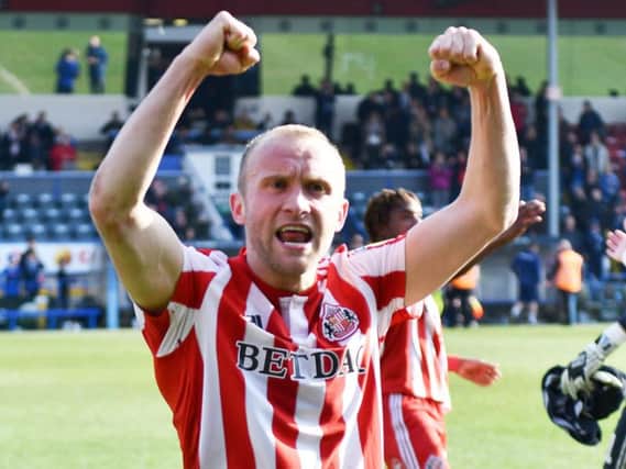 Dylan McGeouch celebrates Sunderland's late win against Rochdale