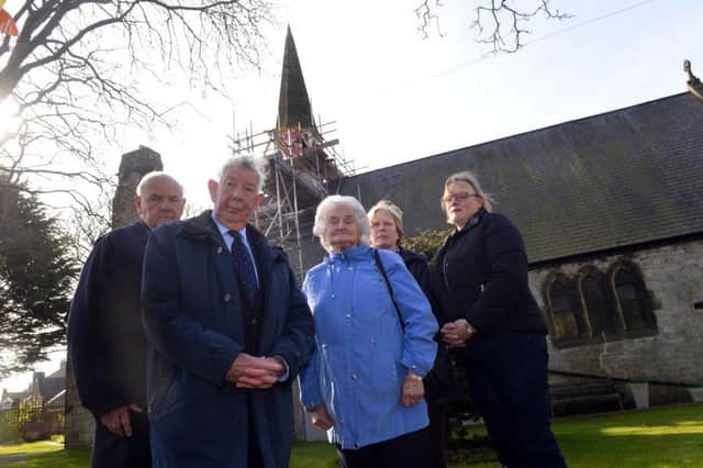 All Saints Church spire repair fund campaign as reached the half way point. From left Bryan Saunders, Keith Higgin, Jean Higgin, Anne Hudson and Jenny Grant