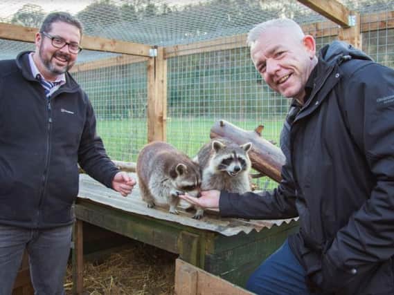 Sean McQuaid, left, and Jim Bates of Dere Street Homes with two of the new residents at East Durham College.