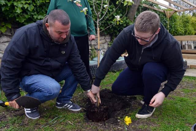 Former Blue Peter gardener Chris Collins and group volunteer James Donaghy