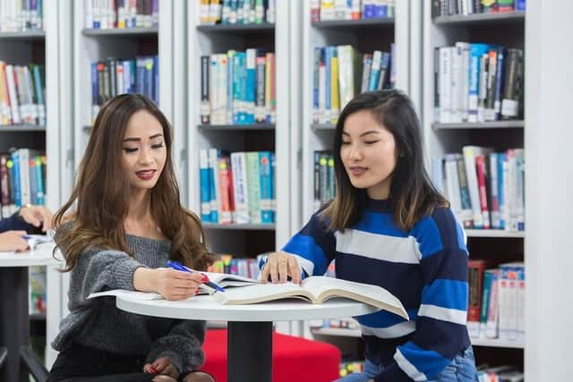 Students make use of the library at the Hong Kong campus of The University of Sunderland.