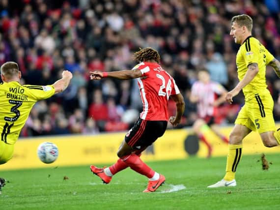 Sunderland moved into second after a frenetic draw with Burton Albion