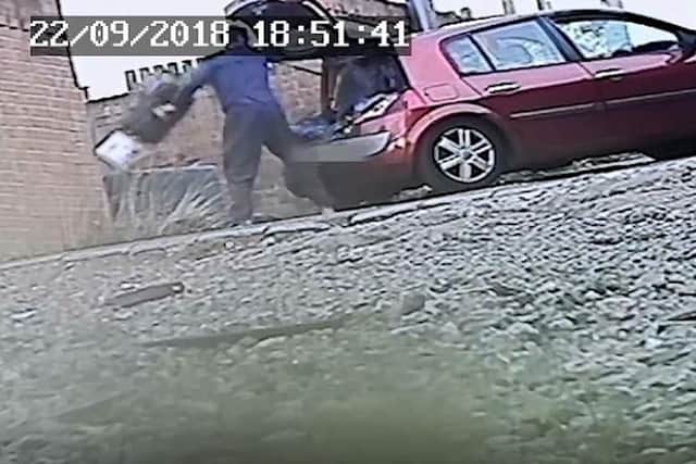 A covert camera captured John Hall flytipping waste from a car.