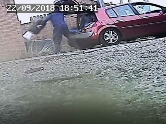 A covert camera captured John Hall flytipping waste from a car.