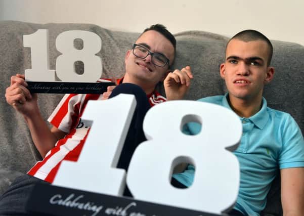 Thomas and brother Jack Ferry (R) celebrate their 18th birthday