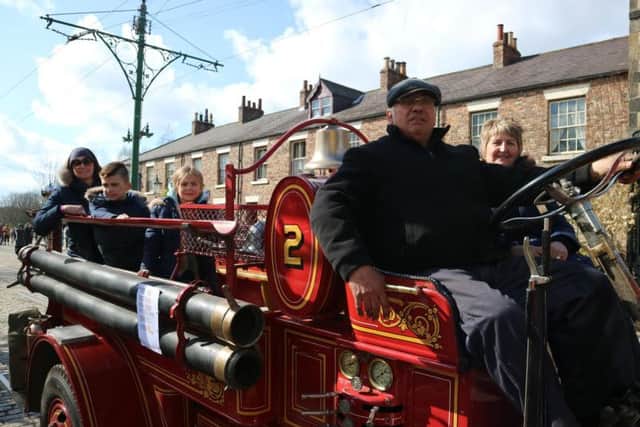 Peter takes the family for a spin on the engine. Picture: Beamish Museum.