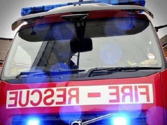 Fire crews are dealing with a blaze at a garage in Blackhall Colliery.