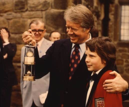President Jimmy Carter with the miners lamp presented to him by Ian McAree.