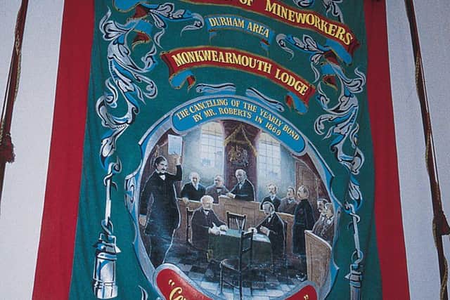 The miners' banner which hangs at the Stadium of Light