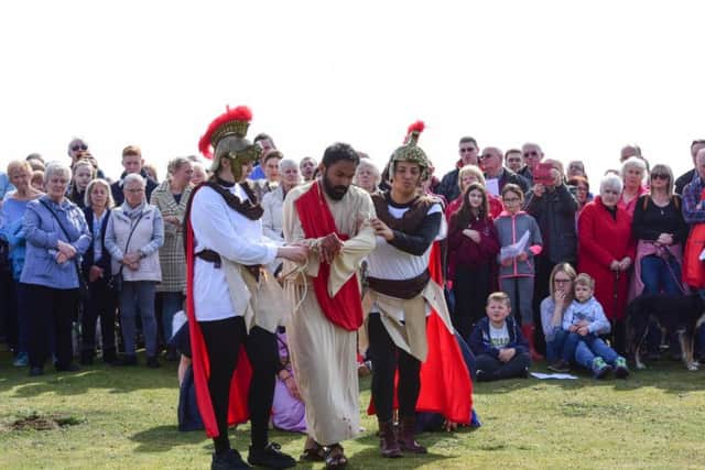 Crowds gather to watch the Passion Play at Tunstall Hill
