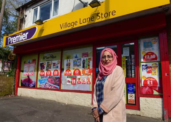 Shakilah Ahmed who owner of the Premier Village Lane Store, Washington Village, which was raided by a man carrying a large knife.