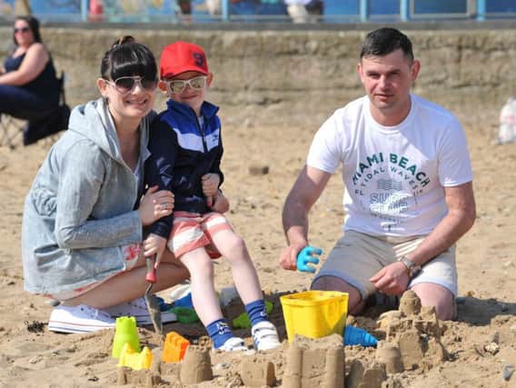 Justyan and Zibi Turkosz with son Szymon enjoying the Easter Bank Holiday Monday weather at Roker Beach, Sunderland.