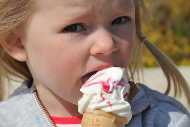 Three year old Jessica Dunn enjoying the Easter Bank Holiday Monday weather at Roker Beach, Sunderland.