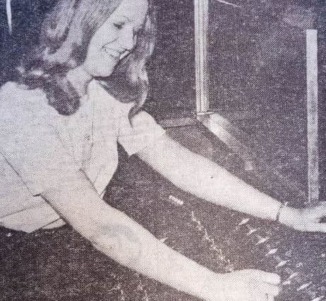 Margaret Charlton at the control panel.