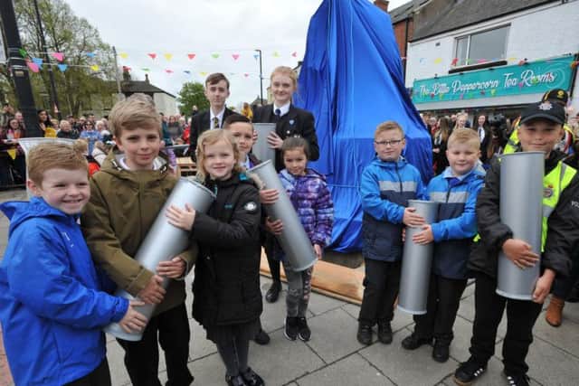 Pupils with their Time Capsules at the unveiling of Ray Lonsdale's newly created sculpture in Hetton-le-Hole.