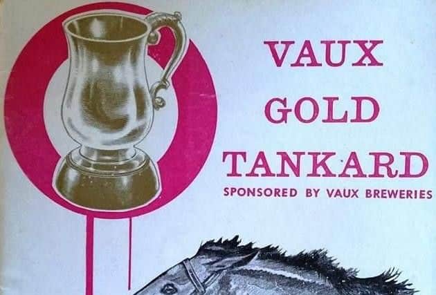 An image of one of the gold tankards on the front of a 1964 racing programme from Redcar.