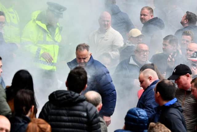 The game was held up for four minutes while police and stewards dealt with the flare-throwing incident at Sunderland v Portsmouth.