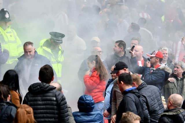 The flare in amongst the Sunderland fans at the Portsmouth fixture